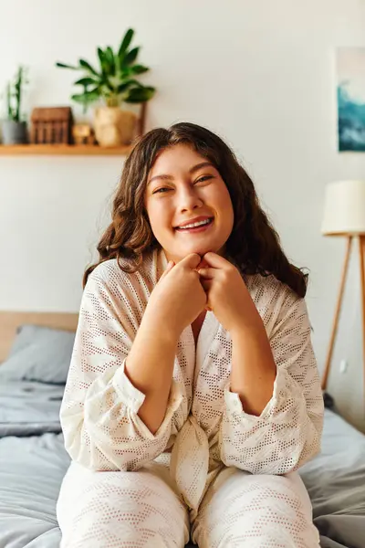 A joyful young woman enjoys her time at home, radiating confidence in comfortable attire. — Stock Photo
