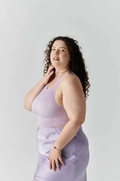 A stunning plus size woman exudes confidence and elegance, showcasing her beauty and style. — Stock Photo