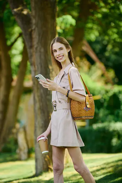 Out in nature, a young woman with anorexia smiles brightly — Stock Photo