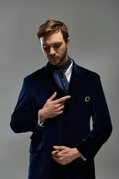 A dapper man in a sophisticated velvet coat presents a refined sense of fashion and style. — Stock Photo