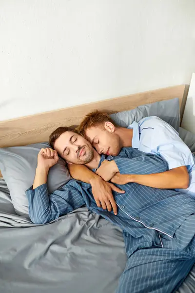 Two partners enjoy a relaxed morning in pajamas, sharing tender moments filled with love and intimacy. — Stock Photo