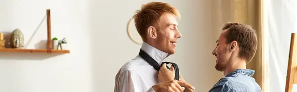 A loving gay couple enjoying a cozy morning, wrapped in each others warmth and playful affection. — Stock Photo