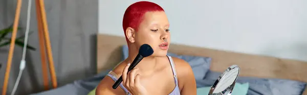 Inside a serene room, a young woman plays with makeup, reflecting her unique style and personality. — Stock Photo