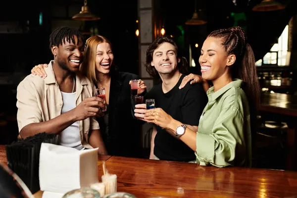 Young professionals celebrate together, raising glasses at a corporate event. — Stock Photo