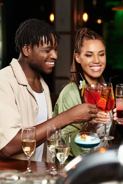 Colleagues toast in a joyful atmosphere of cheers and camaraderie. — Stock Photo