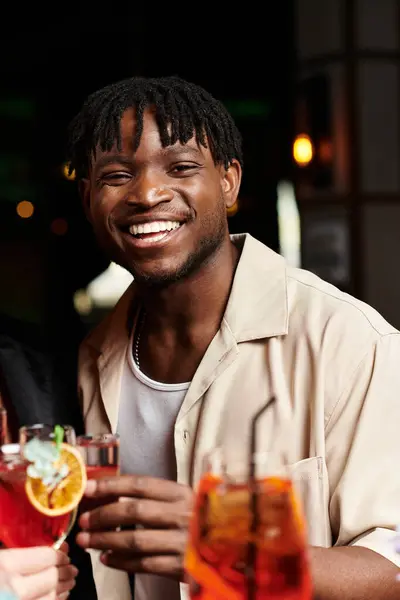 Lively young man during a corporate celebration event. — Stock Photo