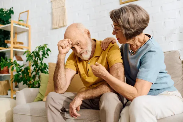 A devoted wife offers support to her husband living with diabetes in their cozy home. — Stock Photo