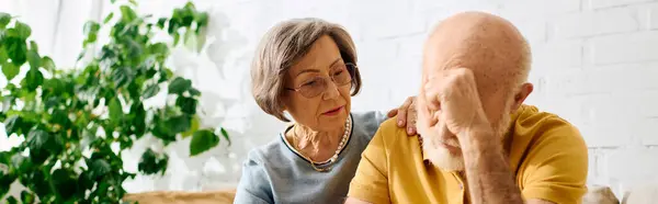 A devoted wife comforts her husband dealing with diabetes in their warm, inviting home. — Stock Photo