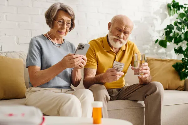 A devoted wife supports her husband with diabetes as they manage medication at home. — Stock Photo