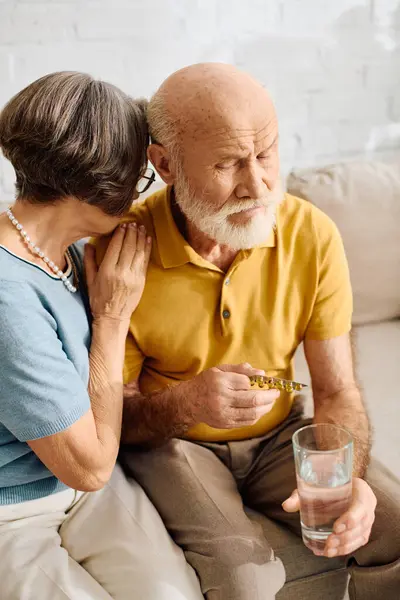 A loving wife comforts her husband as they navigate diabetes together at home. — Stock Photo