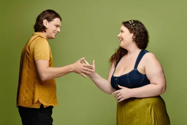 Two friends are enjoying a cheerful interaction, exchanging smiles and gestures. — Stock Photo