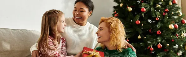 A warm family moment filled with love and laughter during the holidays at home. — Stock Photo
