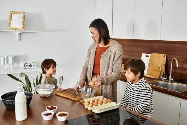 A joyful grandmother shares special moments baking with her grandsons while preparing for Christmas. — Stock Photo