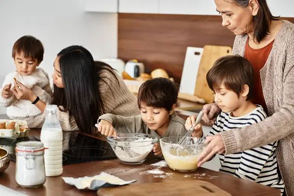 A cheerful family gathers in a modern kitchen, joyfully baking festive treats together for Christmas. — Stock Photo