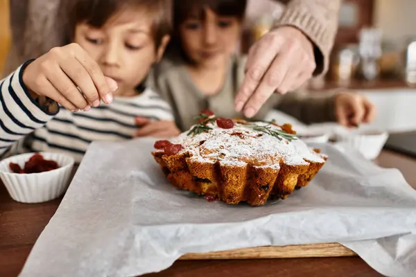 A joyful family is baking delicious holiday treats in a modern kitchen, creating lasting memories. — Stock Photo