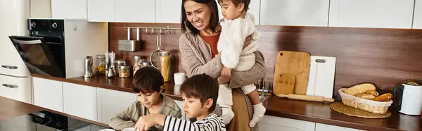 A happy family prepares holiday desserts in their stylish kitchen, creating memories together with children. — Stock Photo