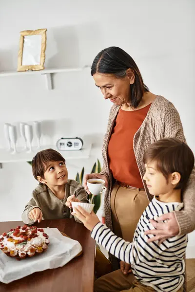 A cheerful family enjoys baking together in a stylish kitchen, creating holiday treats with love. — Stock Photo