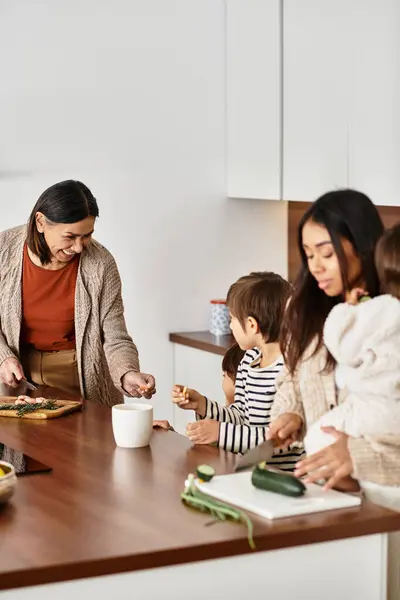 A joyful family prepares festive meal, with children eagerly helping in a modern kitchen before Christmas. — Stock Photo