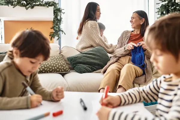 A happy family enjoys quality time together, celebrating the holiday spirit and creating lasting memories. — Stock Photo