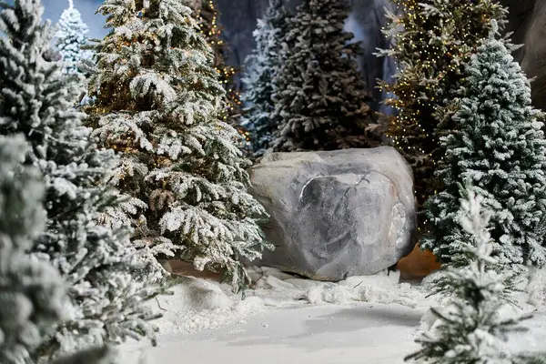Snow blankets the serene pine trees, creating a peaceful winter landscape perfect for holiday celebrations. — Stock Photo