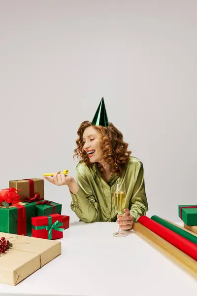 The young woman savors the moment, joyfully posing cheerfully surrounded by colorful decorations. — Stock Photo