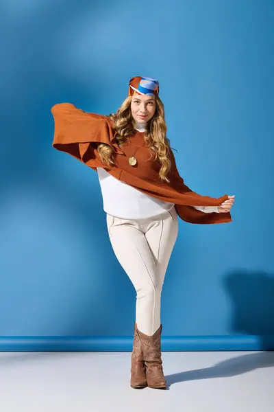A young woman confidently displays her stylish outfit, highlighting her unique fashion sense. — Stock Photo