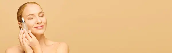 A young beautiful plus size woman is pampering herself while applying skincare products. — Stock Photo