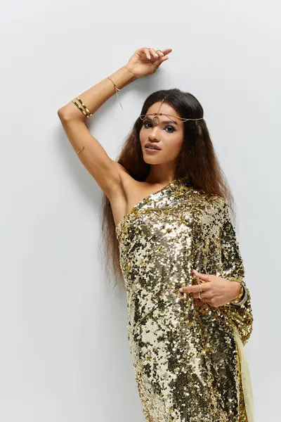 An enchanting African American woman radiates beauty in a sparkling golden gown, exuding confidence and grace. — Stock Photo