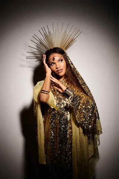 An African American goddess radiates confidence in a dazzling golden outfit, showcasing her vibrant beauty. — Stock Photo