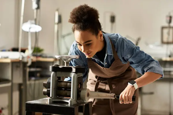 A talented woman passionately works on her jewelry making process in a vibrant studio. — Stock Photo