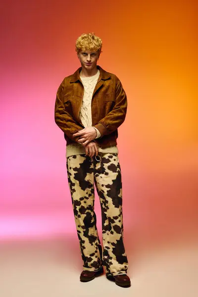 Standing confidently, a man showcases a unique holiday fashion look for Christmas 2025. — Stock Photo