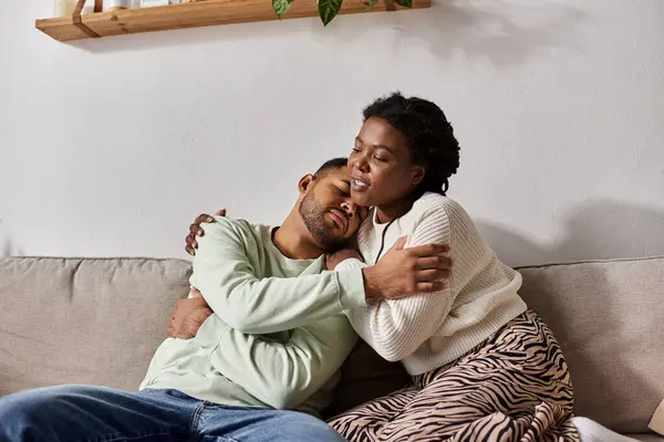 African American couple wearing cozy sweaters during winter, woman comforting her sad man — Stock Photo