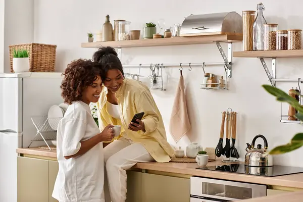 Young african american couple shares joy and connection while relaxing in their cozy apartment. — Stock Photo