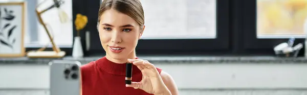 Engaging with her audience, a millennial influencer promotes beauty products while streaming, banner — Stock Photo