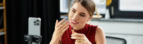 A young woman demonstrates her favorite beauty products while engaging her online audience, banner — Stock Photo