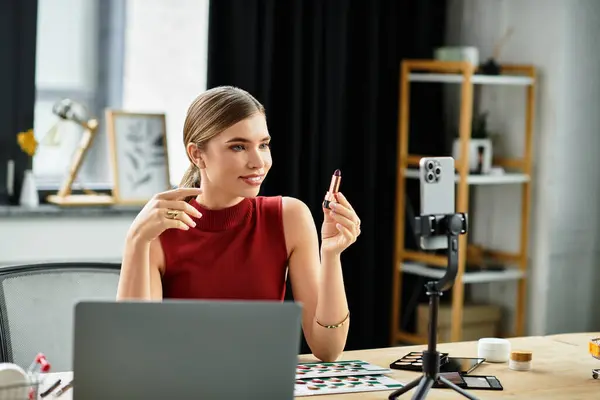 Streaming beauty products, an attractive influencer engages followers through her smartphone. — Stock Photo