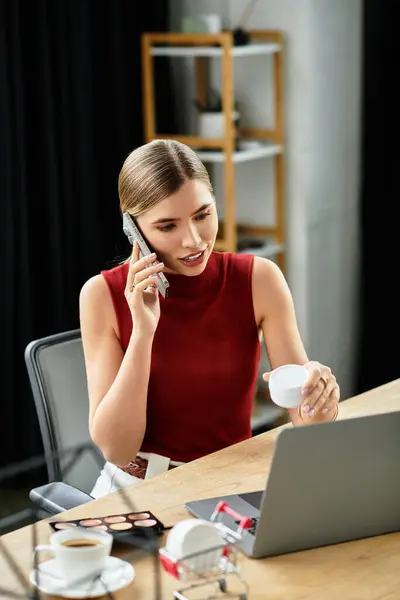 Attractive young woman discusses beauty products while having phone call from a modern workspace. — Stock Photo