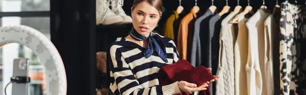 Young woman showcases trendy clothing, sharing her fashion expertise, banner — Stock Photo