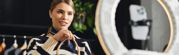 Attractive millennial influencer showcases her unique style while creating content in a studio, banner — Stock Photo