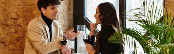 A beautiful couple shares laughter and love while celebrating Valentines Day over dinner, banner — Stock Photo
