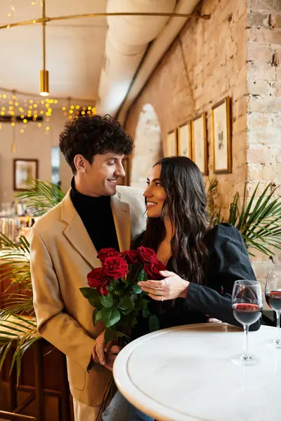 A young couple revels in their love, sharing a special moment while celebrating Valentines Day. — Stock Photo