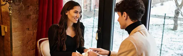 A couple enjoys a romantic Valentines Day, sharing smiles and affection at their table, banner — Stock Photo