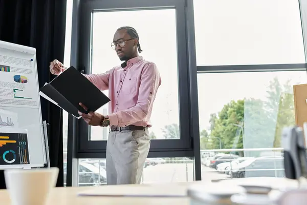 Talented young man engaging in remote work while showcasing innovative concepts to others. — Stock Photo