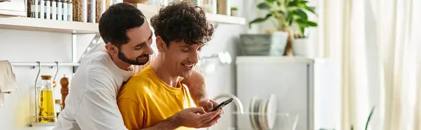 Two men share laughter and love while enjoying a cozy afternoon at home, banner — Stock Photo