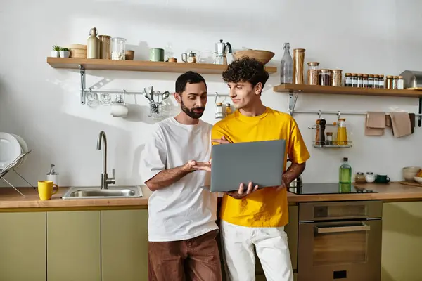Two men share a joyful moment together in their modern apartment. — Stock Photo