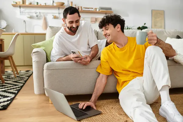 Loving couple enjoying quality time together in their modern apartment while relaxing. — Stock Photo