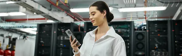 A woman is engaged in her work, checking systems in a high-tech server room, banner — Stock Photo