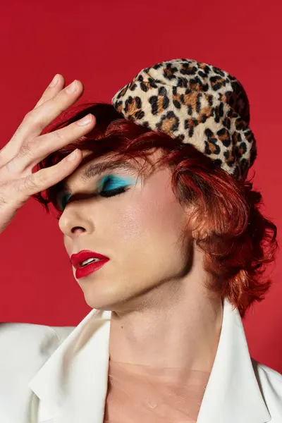 This individual captivates with stunning makeup and vibrant fashion. — Stock Photo