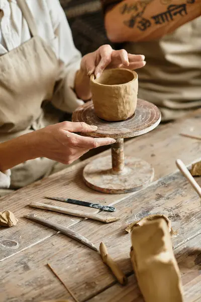 Cropped woman works to shape clay, creating lasting memories in pottery class. — Stock Photo