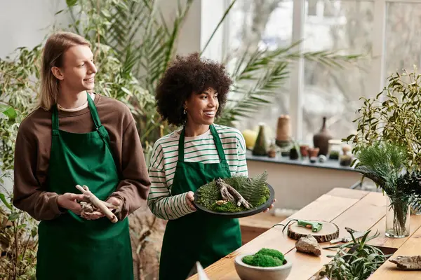 Participants joyfully plant succulents and build connections in a lively workshop. — Stock Photo